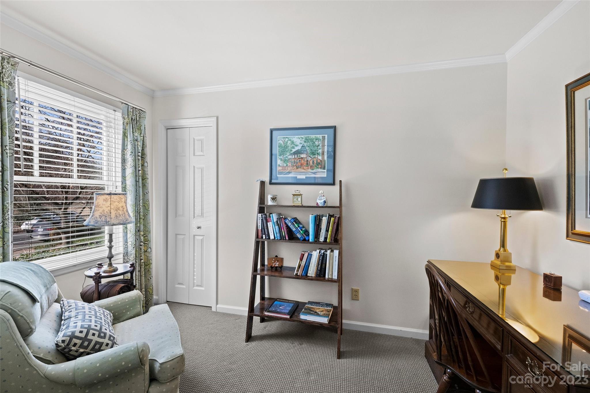 711 Romany Road Charlotte, NC 28203 - Photo 16 of 28 a living room with furniture and a flat screen tv