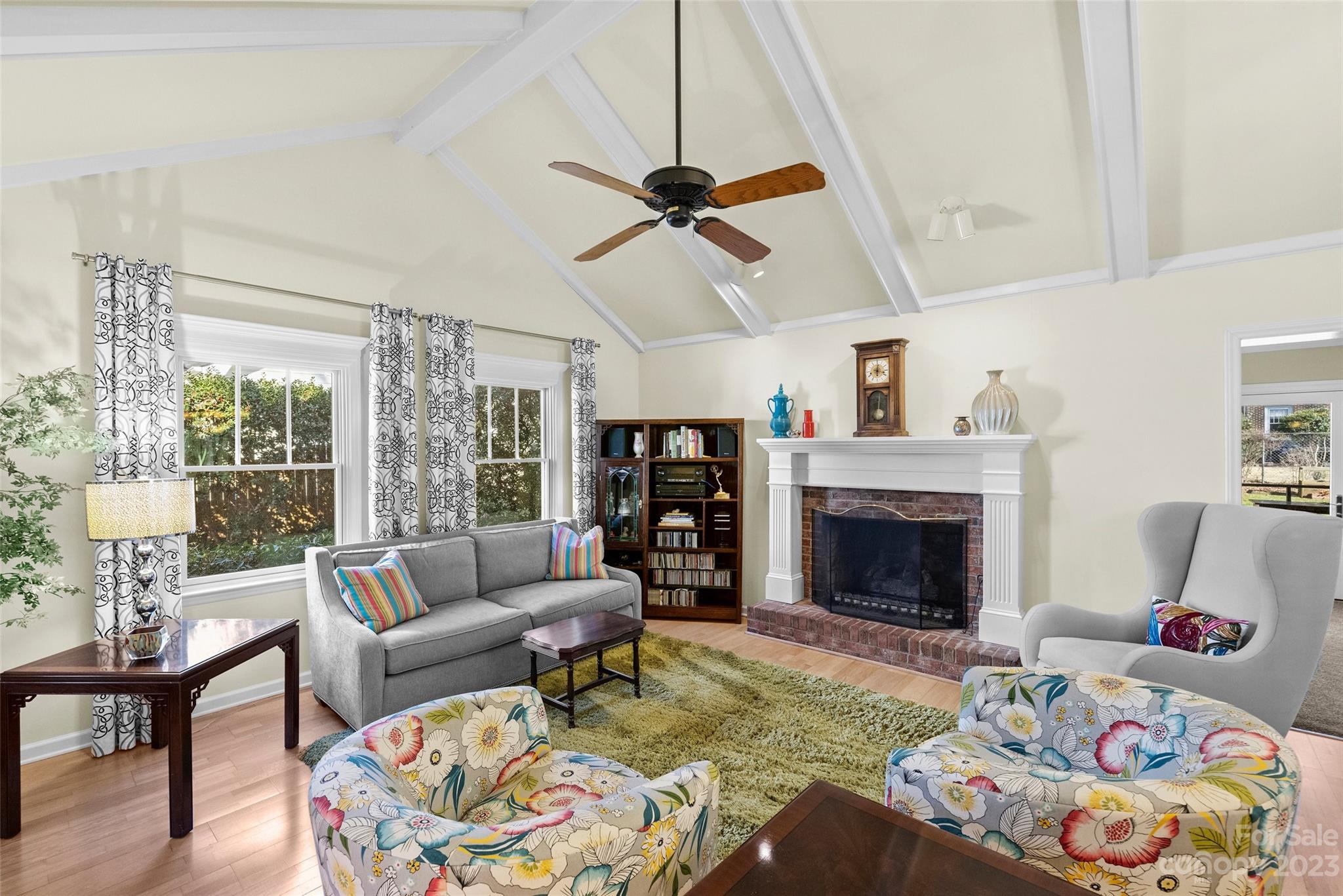 711 Romany Road Charlotte, NC 28203 - Photo 4 of 28 a living room with furniture and a fireplace