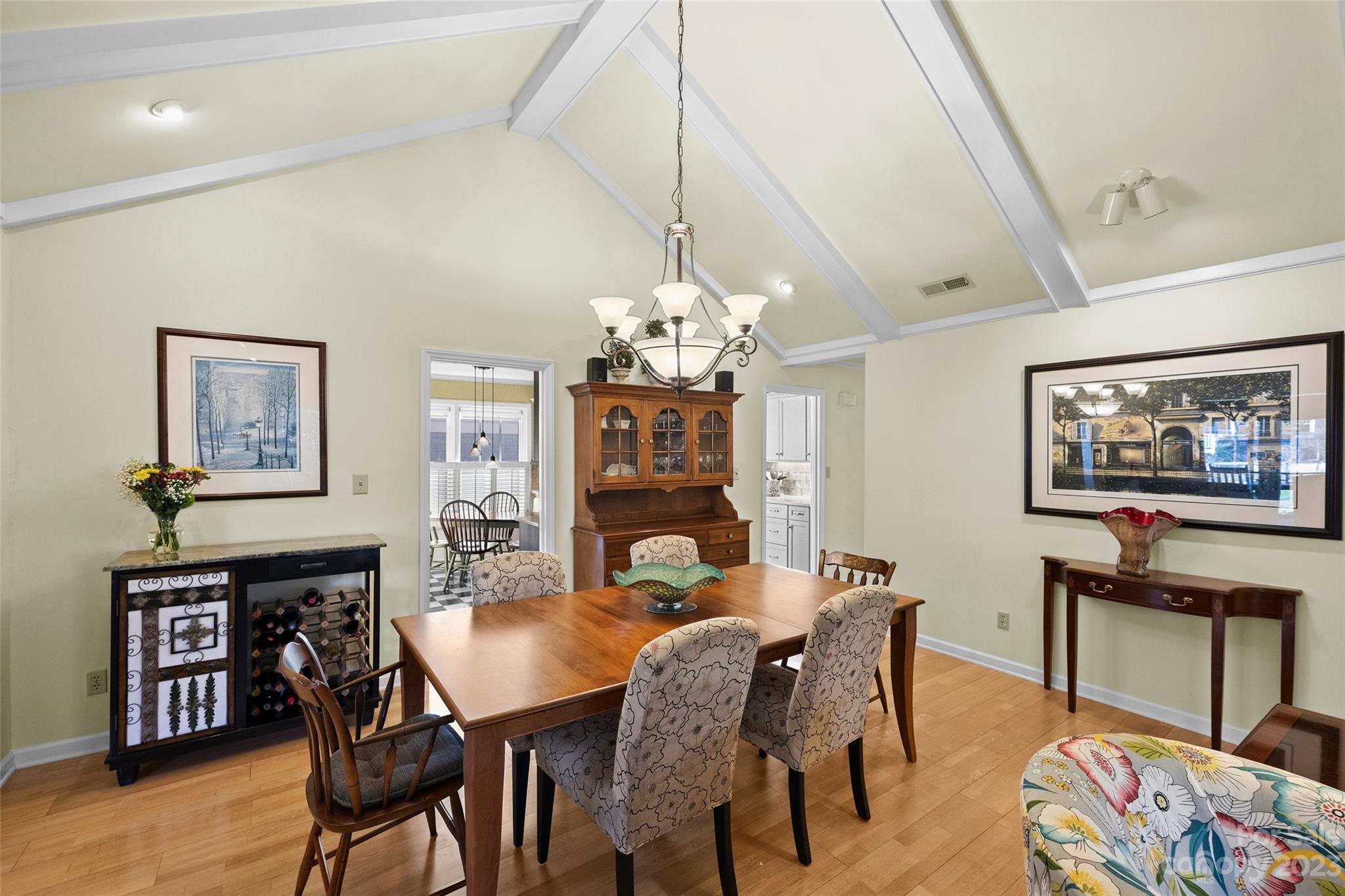 711 Romany Road Charlotte, NC 28203 - Photo 6 of 28 a view of a dining room with furniture and a chandelier