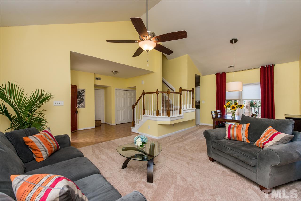 5504 Edgebury Road Raleigh, NC 27613 - Photo 4 of 25 a living room with furniture and a large window
