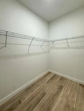 a view of a room with racks on the wall