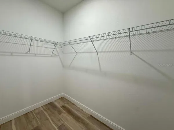 a view of a room with racks on the wall