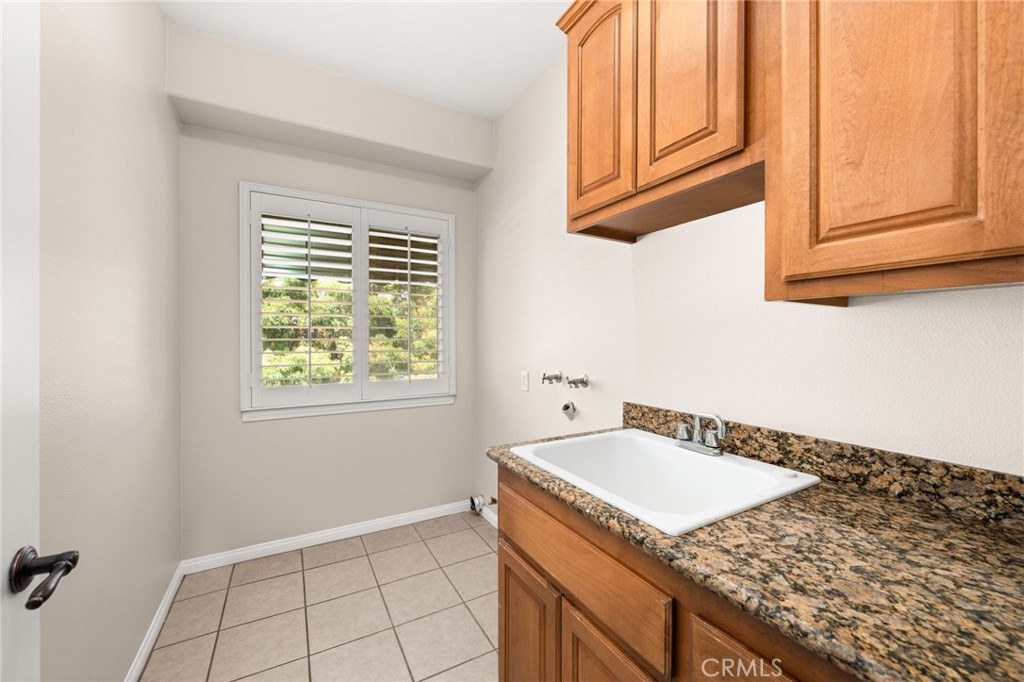 15868 Shorb Street Riverside, CA 92508 - Photo 14 of 15 a bath tub sitting next to a window