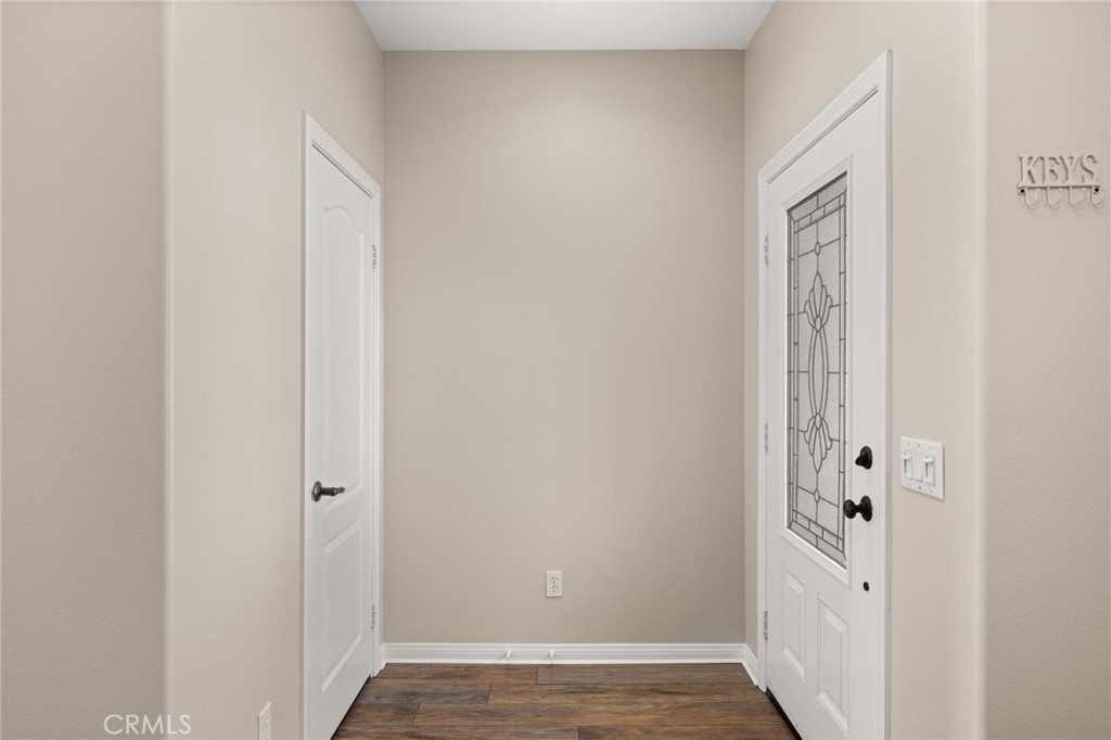 15868 Shorb Street Riverside, CA 92508 - Photo 6 of 15 a view of an entryway with wooden floor