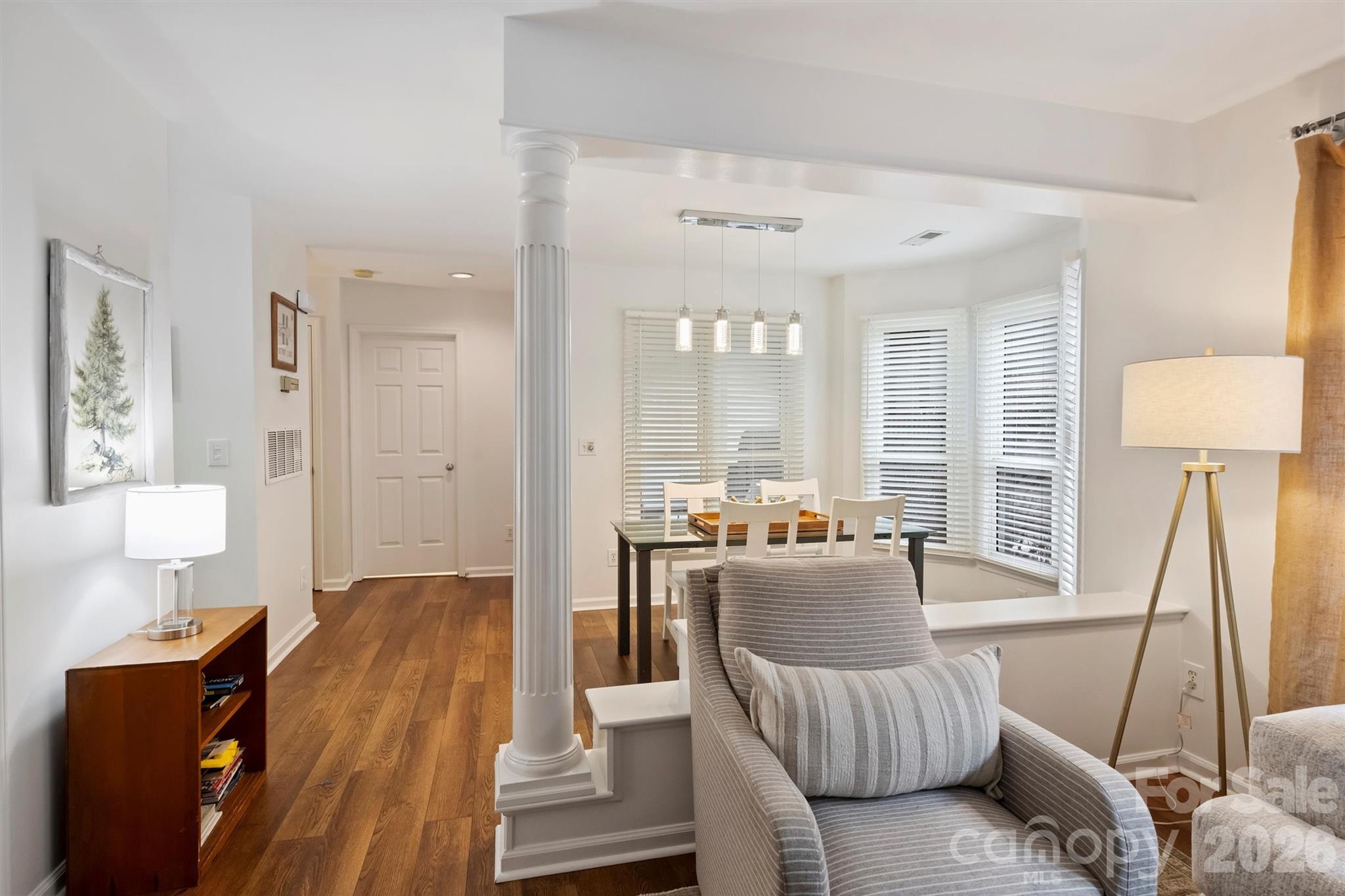 607 Queens Road Charlotte, NC 28207 - Photo 11 of 26 a living room with furniture and a large window