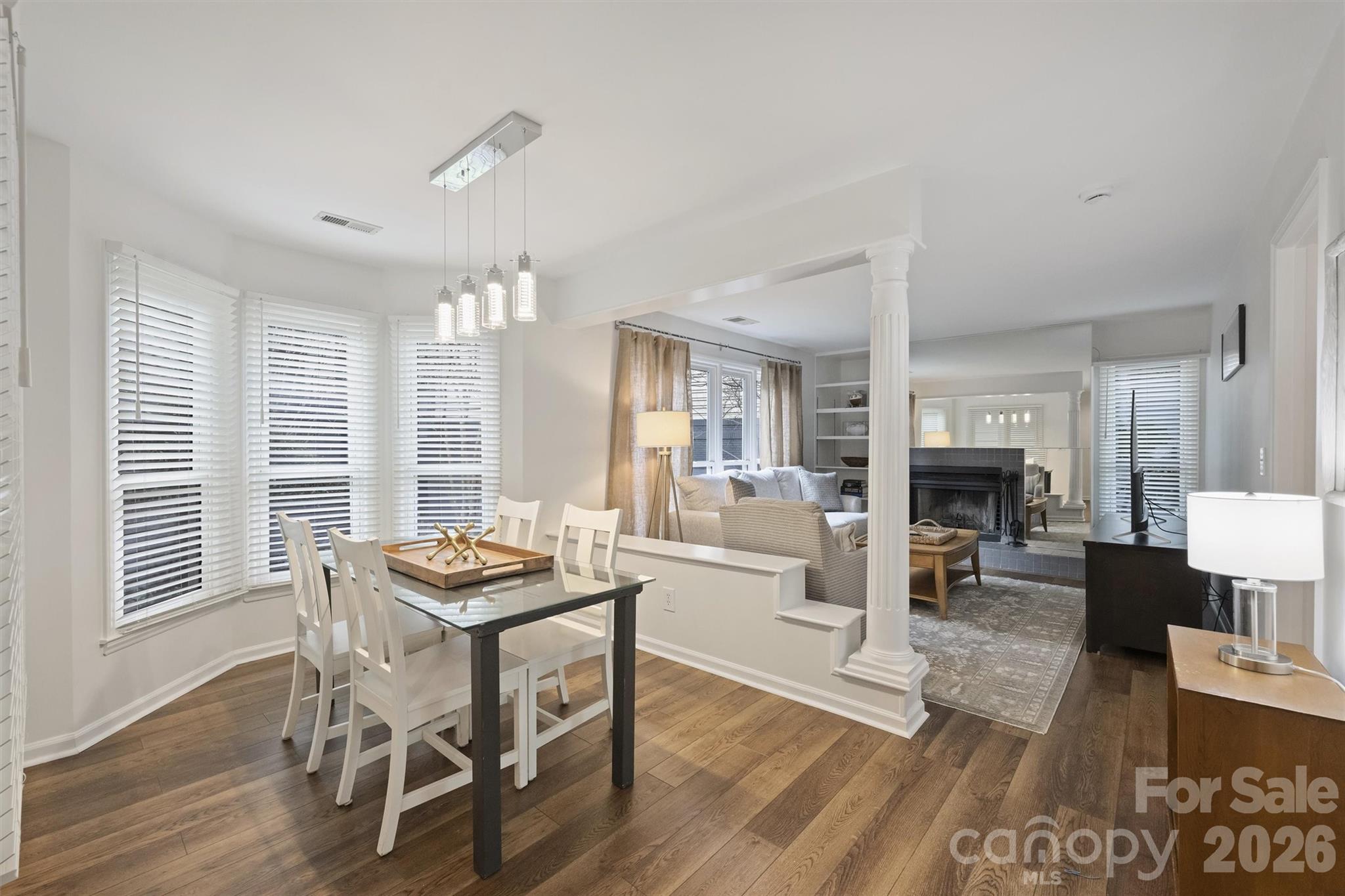 607 Queens Road Charlotte, NC 28207 - Photo 6 of 26 a living room with furniture and a wooden floor