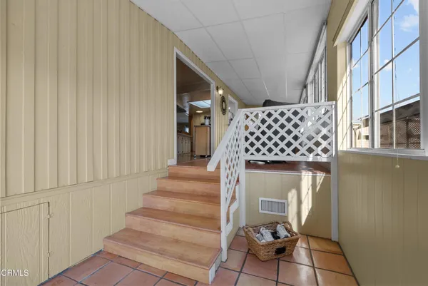 a view of entryway with a front door