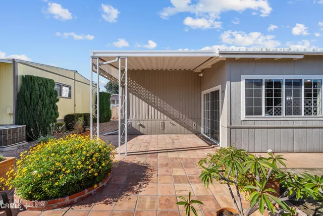 a view of a house with sitting area