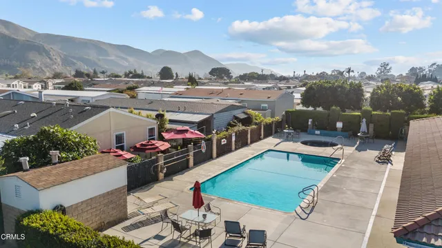 a view of a terrace with sitting area