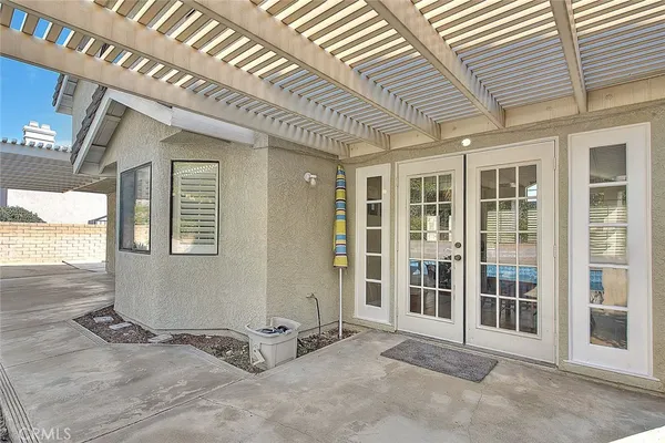 a front view of a house with patio