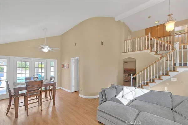a living room with furniture and a table