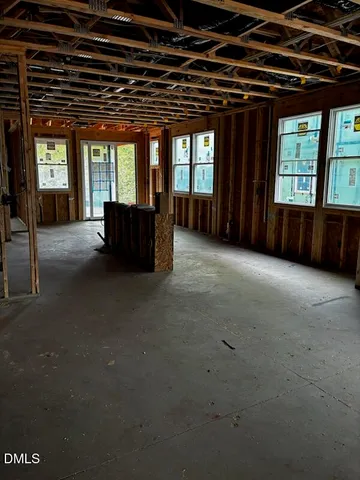 a view of livingroom with furniture and windows