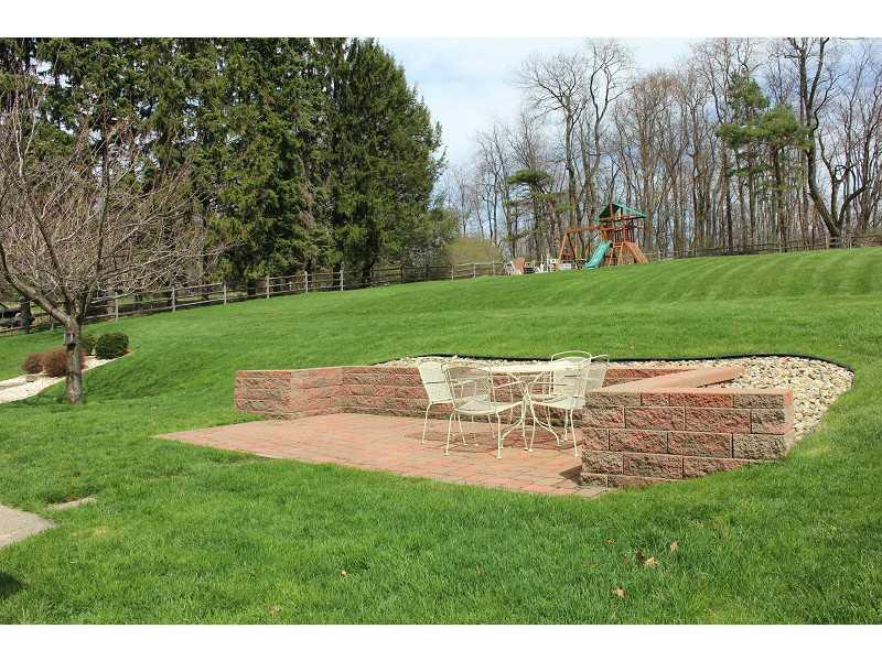 5742 Phillips Road Gibsonia, PA 15044 - Photo 21 of 23 Patio/Deck. When the snow melts and Spring arrives, enjoy the great back yard and second patio.