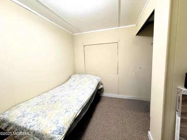 a view of bedroom and bathroom