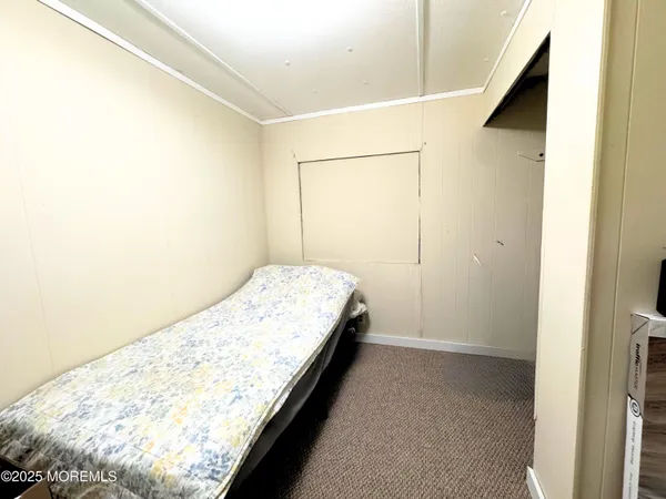 a view of bedroom and bathroom