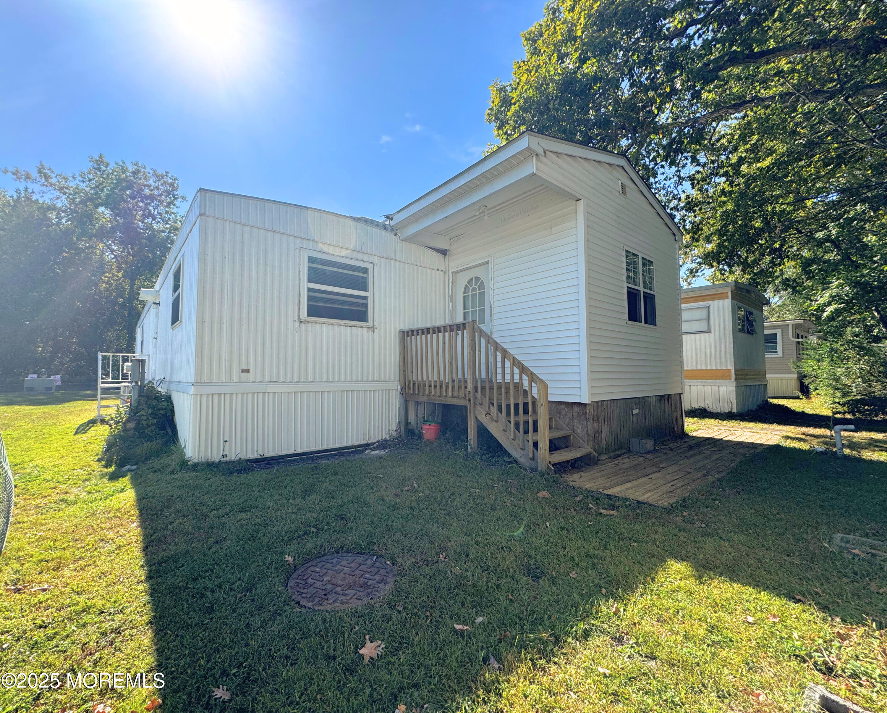 18 Alexander Avenue Jackson, NJ 08527 - Photo 23 of 24 a view of a house with backyard and sitting area