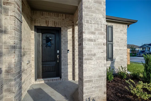 a front view of a house with a shower
