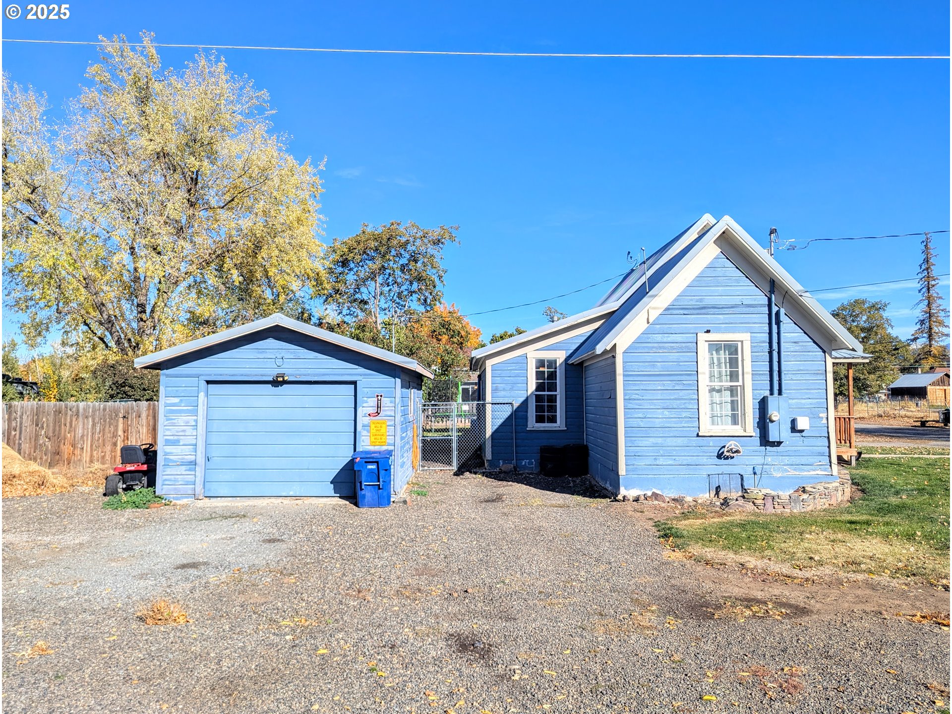 362 South 4th Street Union, OR 97883 - Photo 15 of 19 a front view of a house with a yard and garage