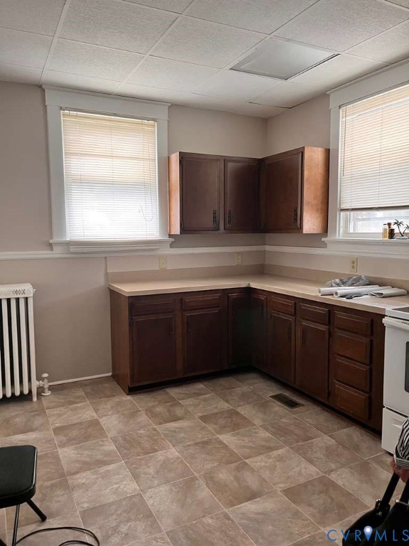 2702 Seminary Avenue Richmond, VA 23220 - Photo 13 of 29 Kitchen with light countertops, radiator heating u