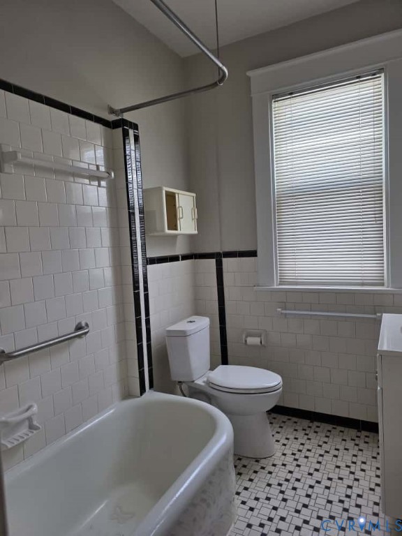 2702 Seminary Avenue Richmond, VA 23220 - Photo 17 of 29 Bathroom featuring tile walls, vanity, light tile