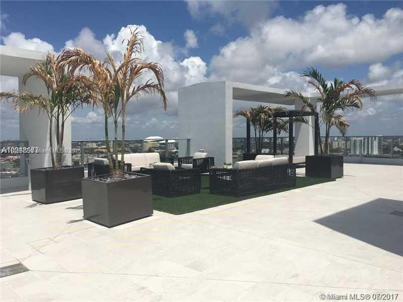 1010 Southwest 2nd Avenue, Unit 1105 Miami, FL 33130 - Photo 13 of 25 a view of a backyard of a house