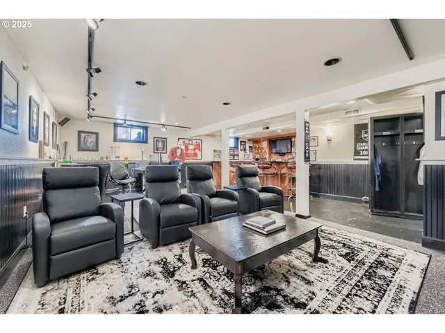 a living room with furniture and a rug