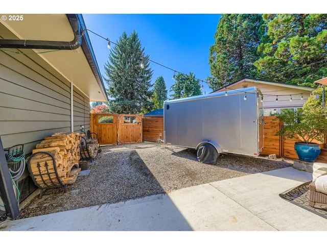 a backyard of a house with seating space