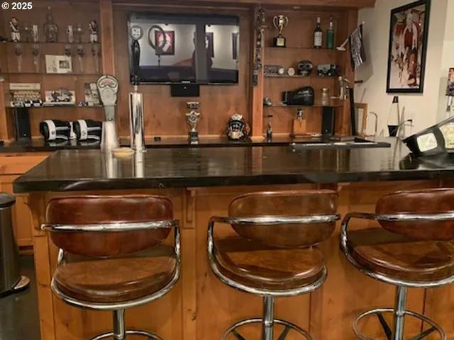 a kitchen with a sink and a stove