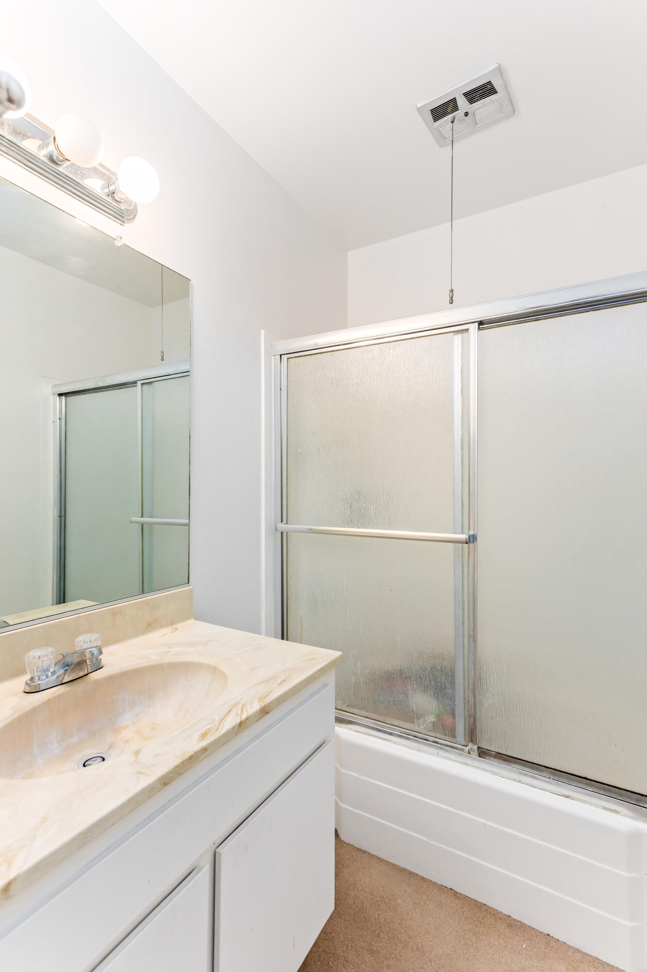 4742 Camino Del Rey Santa Barbara, CA 93110 - Photo 13 of 19 a bathroom with a granite countertop sink mirror and shower