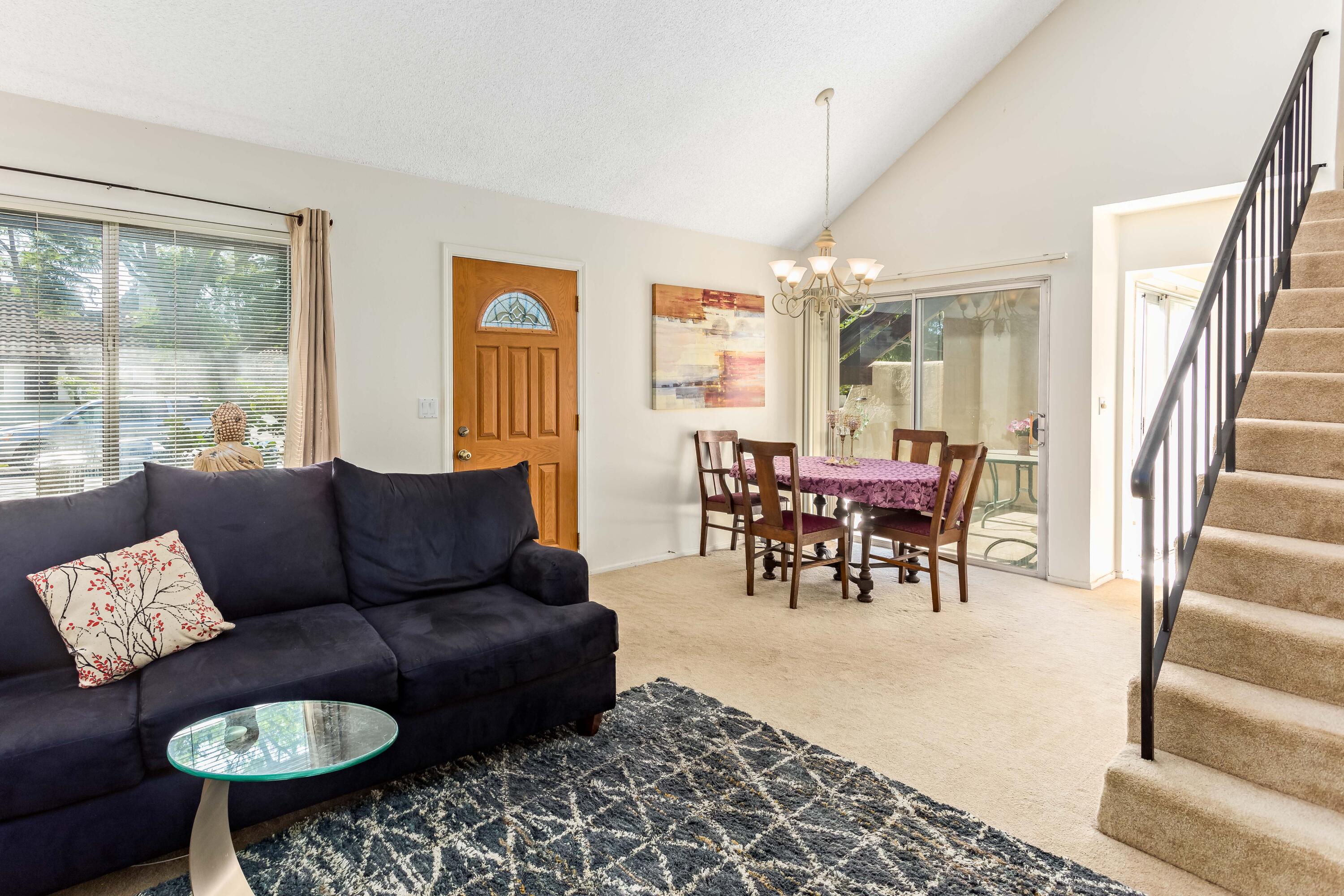 4742 Camino Del Rey Santa Barbara, CA 93110 - Photo 3 of 19 a living room with furniture and a large window