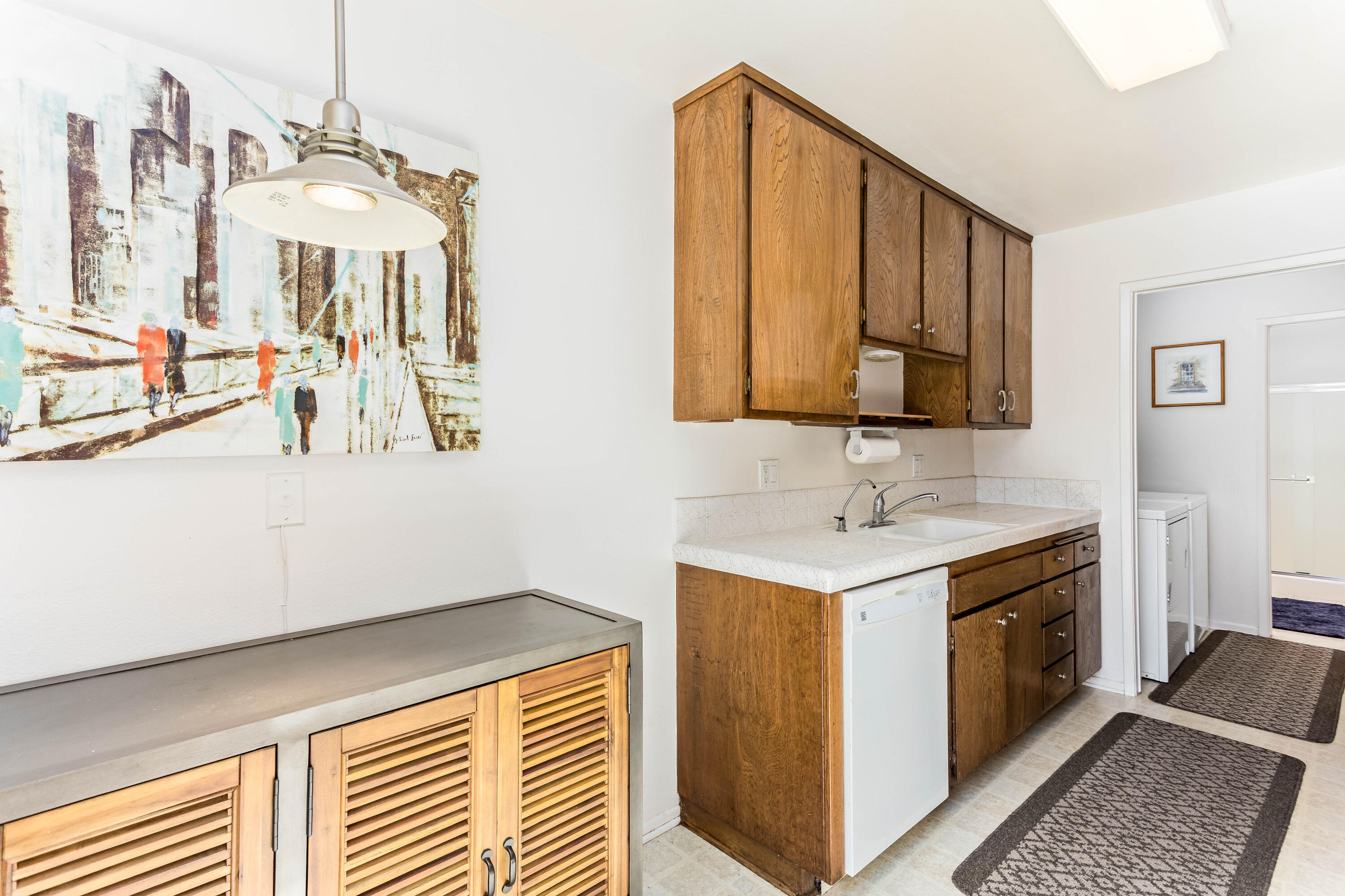 4742 Camino Del Rey Santa Barbara, CA 93110 - Photo 5 of 19 a bathroom with a sink a vanity and a mirror