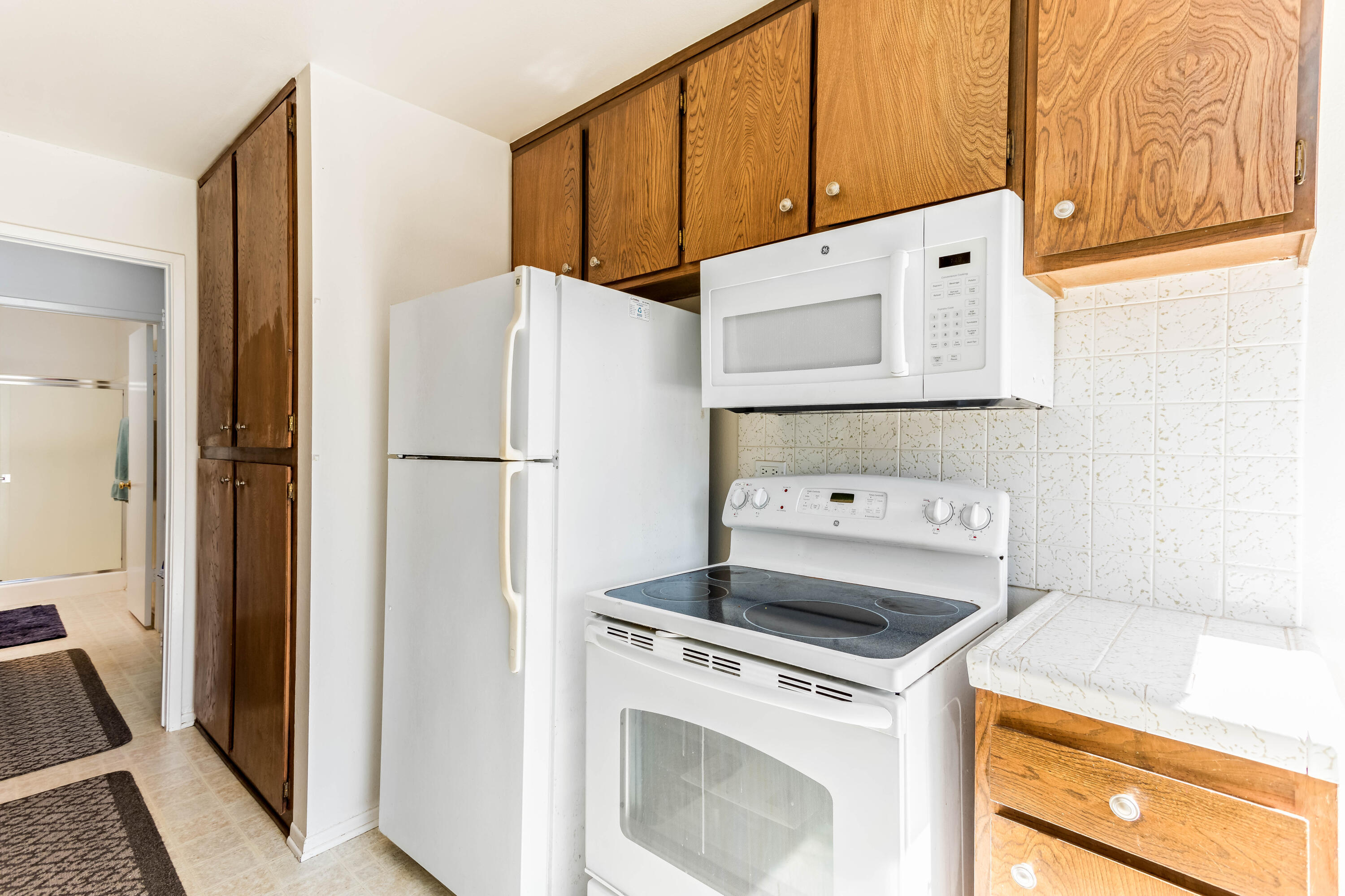 4742 Camino Del Rey Santa Barbara, CA 93110 - Photo 7 of 19 a utility room with dryer and washer