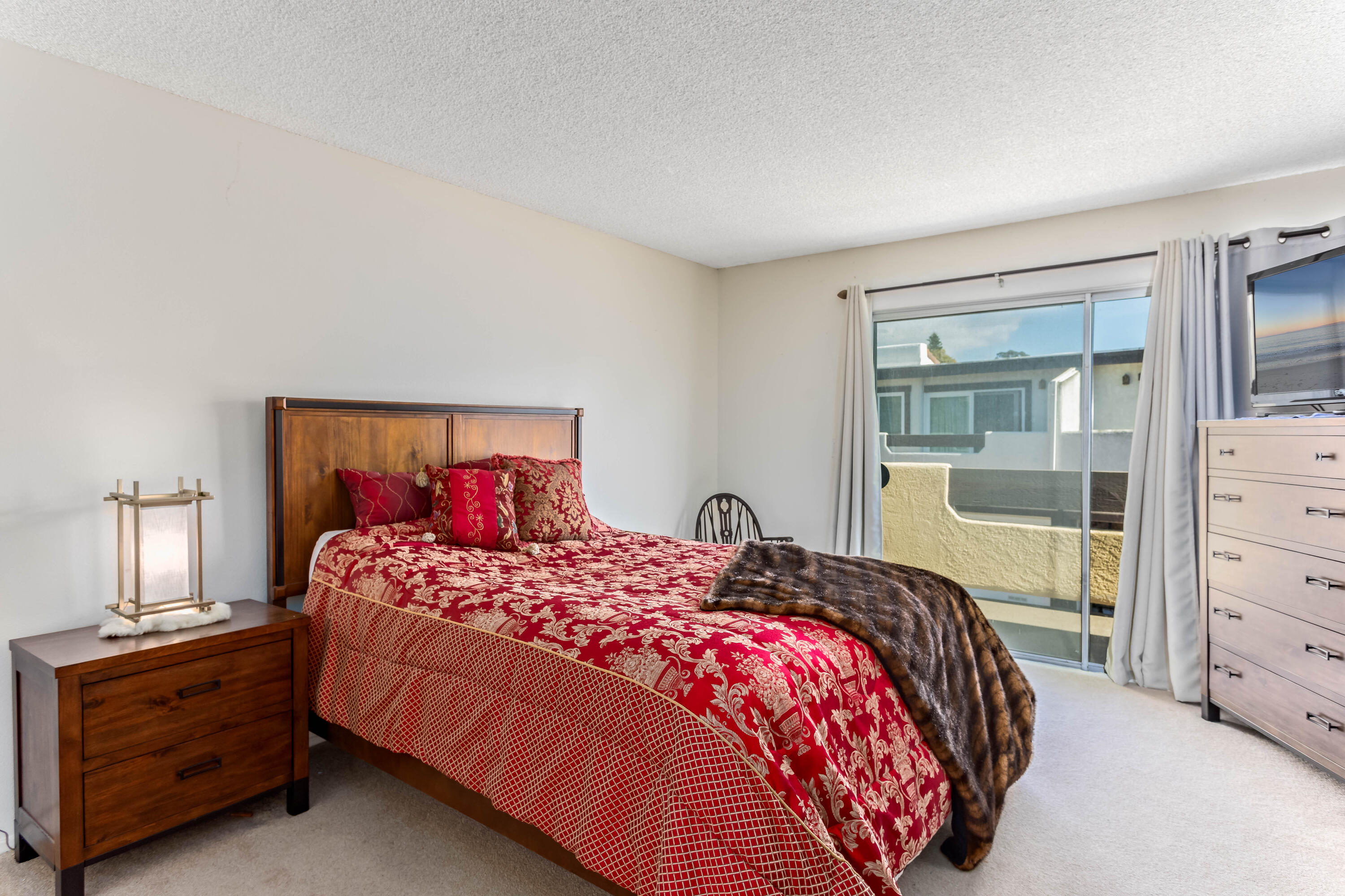 4742 Camino Del Rey Santa Barbara, CA 93110 - Photo 8 of 19 a bedroom with a bed and a window
