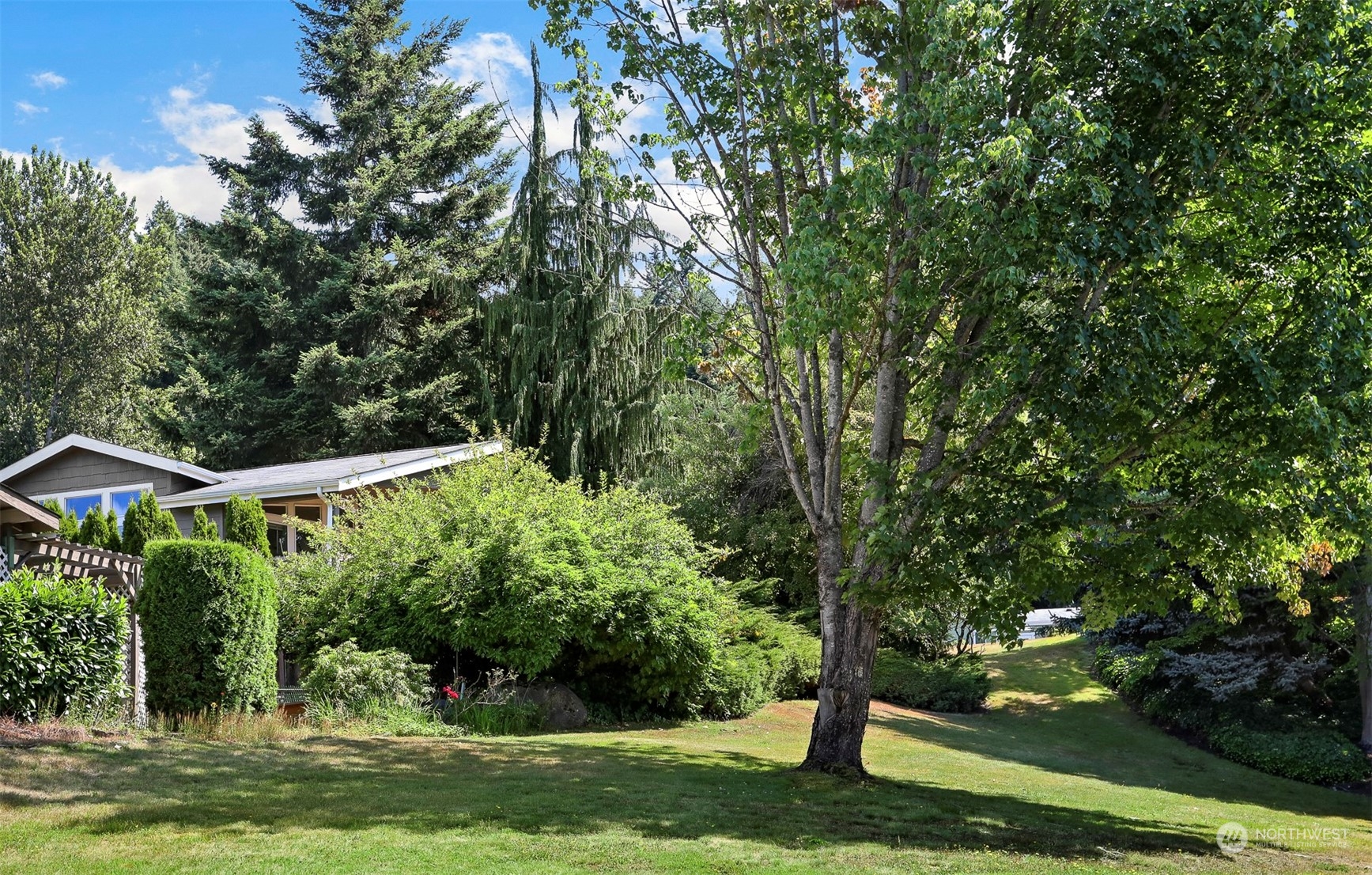 730 236th Place Southwest Bothell, WA 98021 - Photo 36 of 40 a view of a patio with a yard