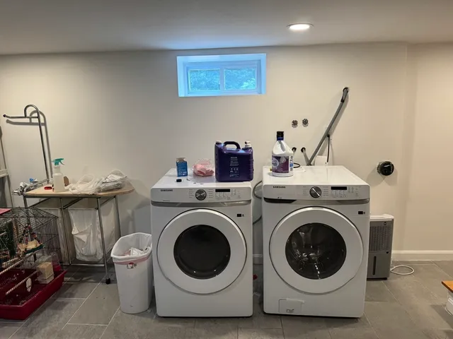 a utility room with dryer and washer