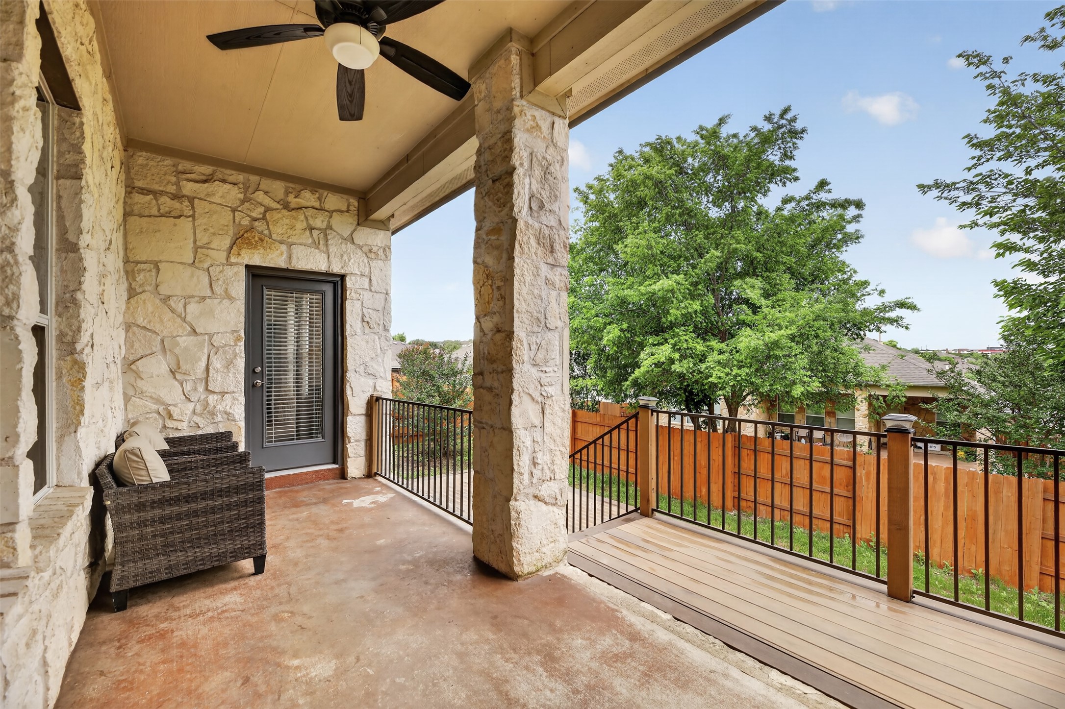 545 Manchester Lane Austin, TX 78737 - Photo 28 of 30 a view of a porch with furniture and a yard