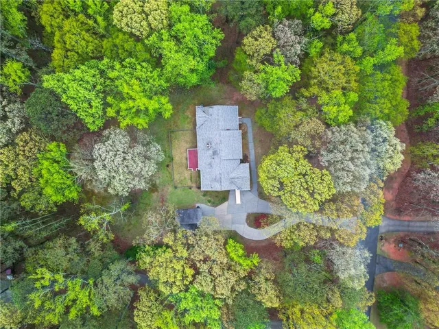 a backyard of a house with lots of green space