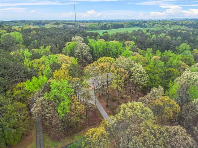 a view of a lake with a building in the background