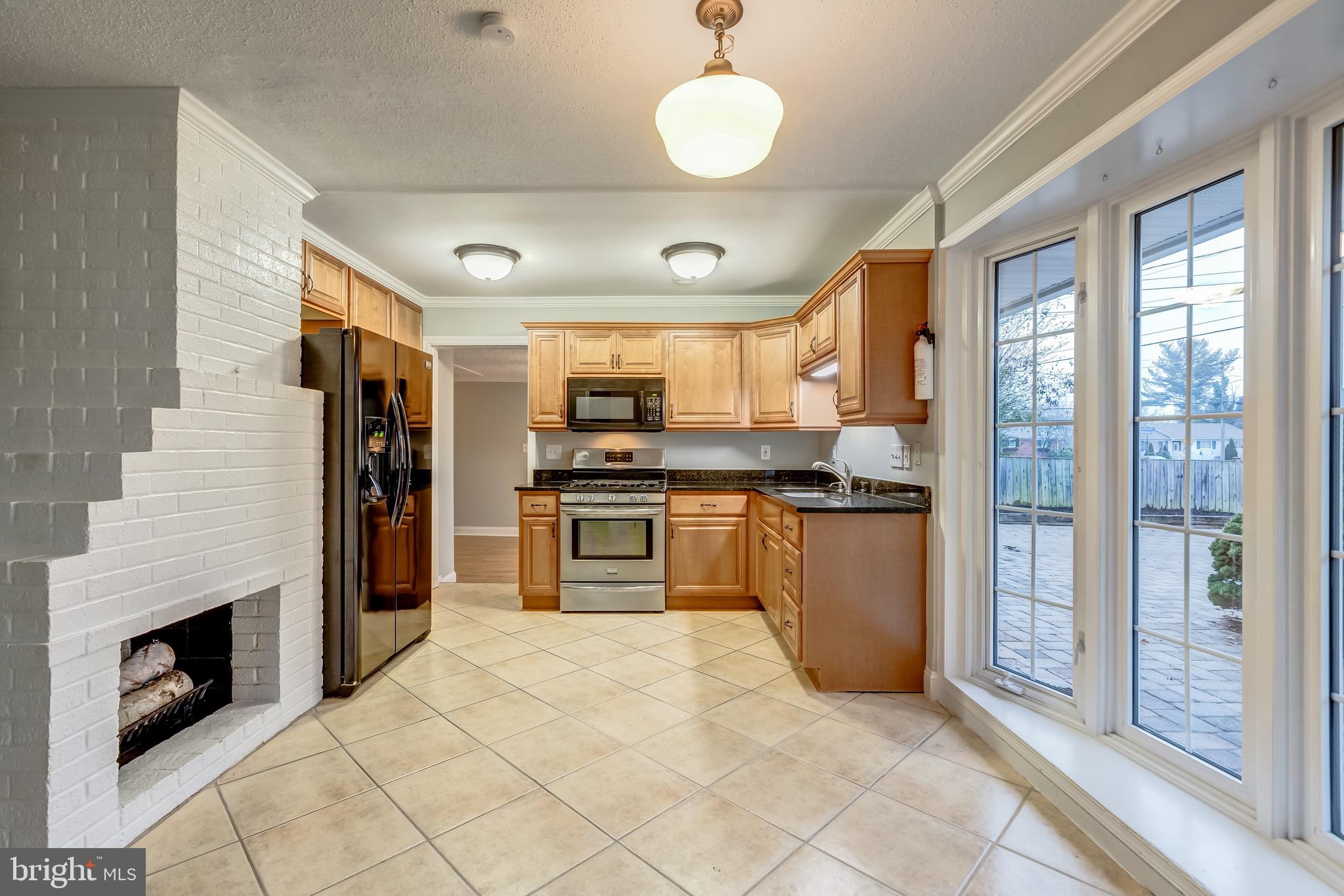 7303 Dickenson Street Springfield, VA 22150 - Photo 13 of 41 Lovely ceramic floor in the kitchen area