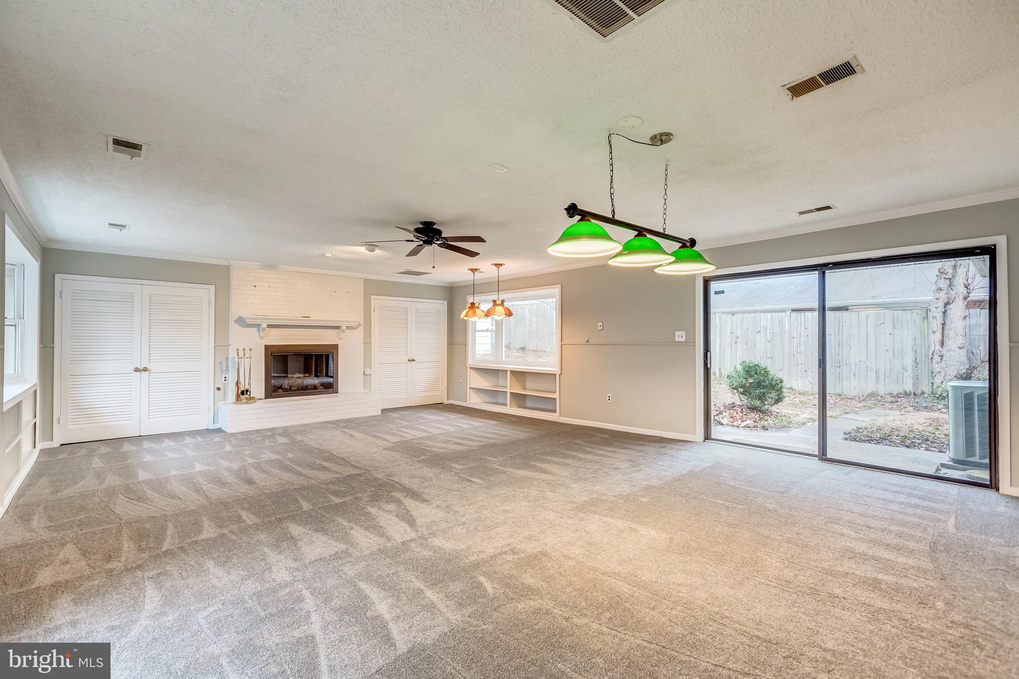 7303 Dickenson Street Springfield, VA 22150 - Photo 25 of 41 Gas fireplace and loads of light