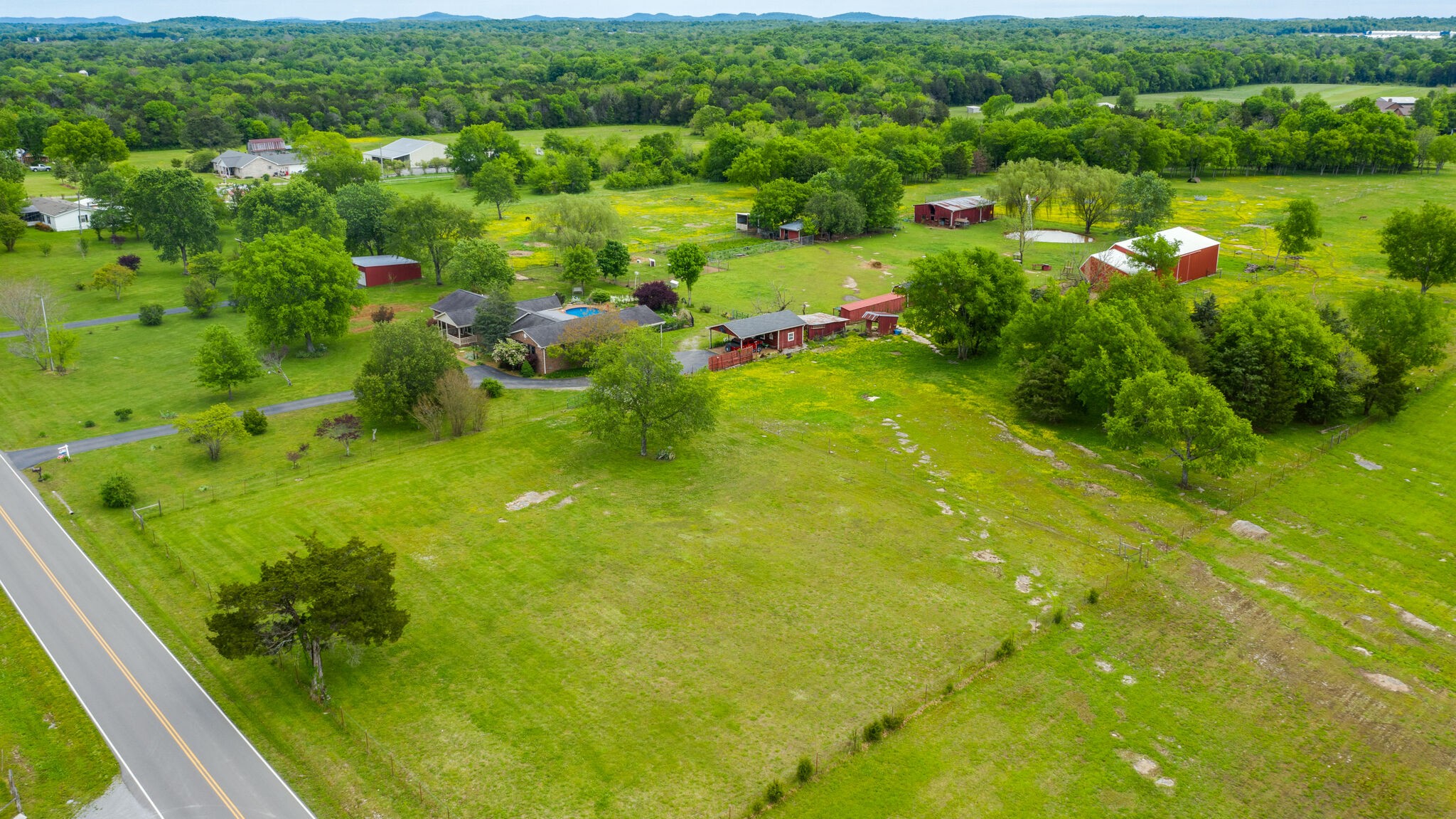 2800 Vesta Road Lebanon, TN 37090 - Photo 54 of 55 a view of a garden with plants and large trees