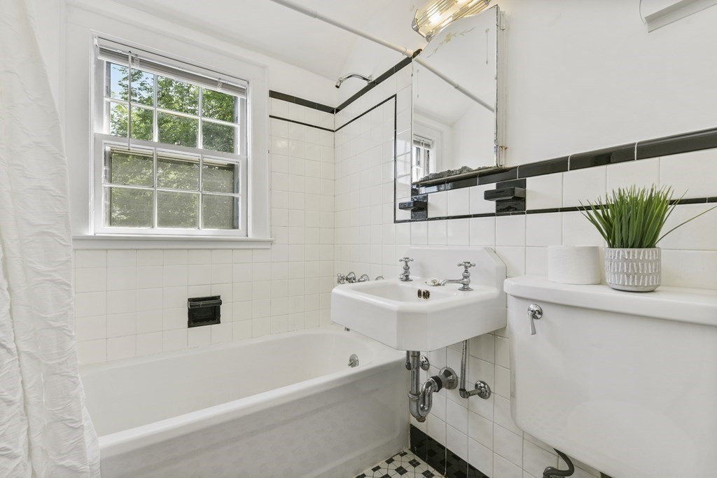 11 Southbourne Road Boston, MA 02130 - Photo 14 of 26 a bathroom with a sink and a bathtub