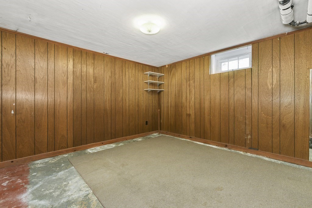 11 Southbourne Road Boston, MA 02130 - Photo 16 of 26 an empty room with a wooden walls