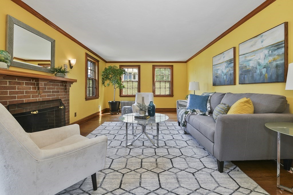11 Southbourne Road Boston, MA 02130 - Photo 2 of 26 a living room with furniture and a fireplace