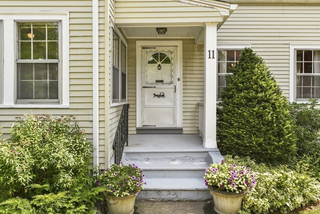 11 Southbourne Road Boston, MA 02130 - Photo 25 of 26 a front view of a house with a garden