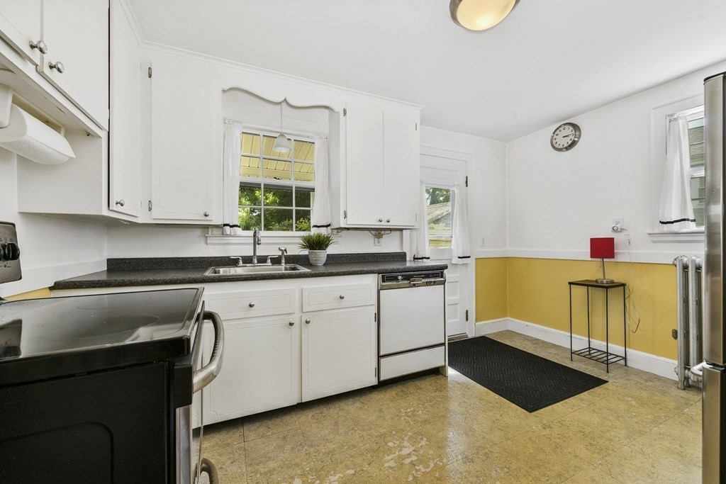 11 Southbourne Road Boston, MA 02130 - Photo 7 of 26 a kitchen with a sink cabinets and window