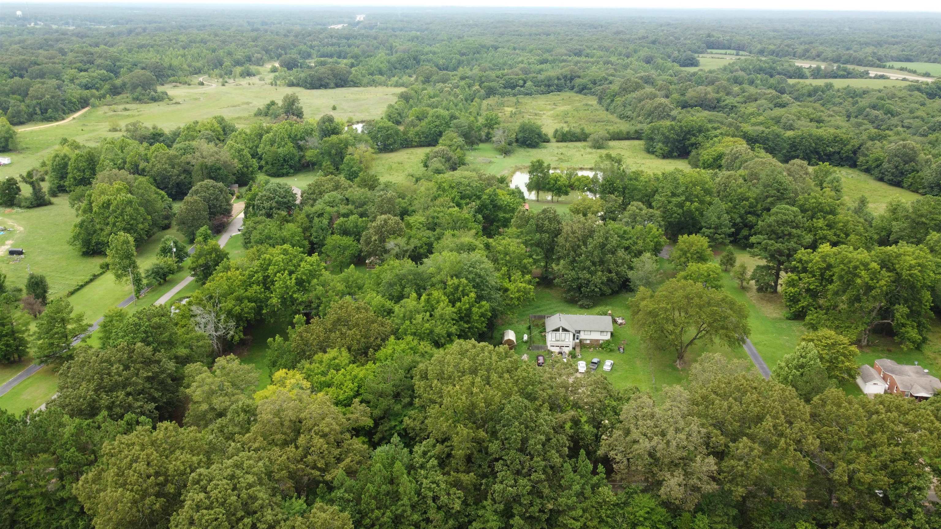 0 Macon Road Eads, TN 38028 - Photo 2 of 8 an aerial view of residential houses with outdoor space and trees