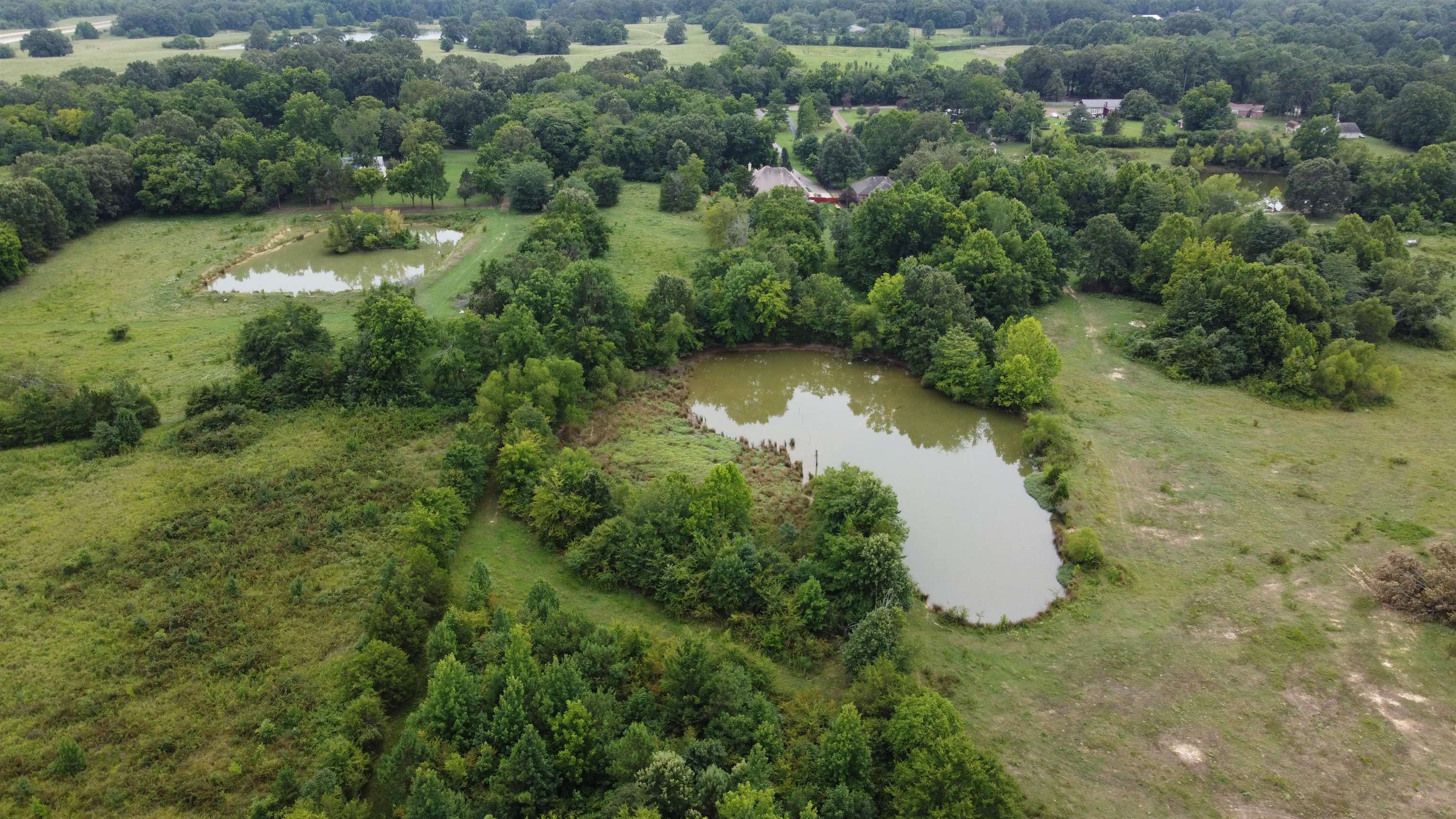 0 Macon Road Eads, TN 38028 - Photo 4 of 8 an aerial view of a house with a yard and lake view