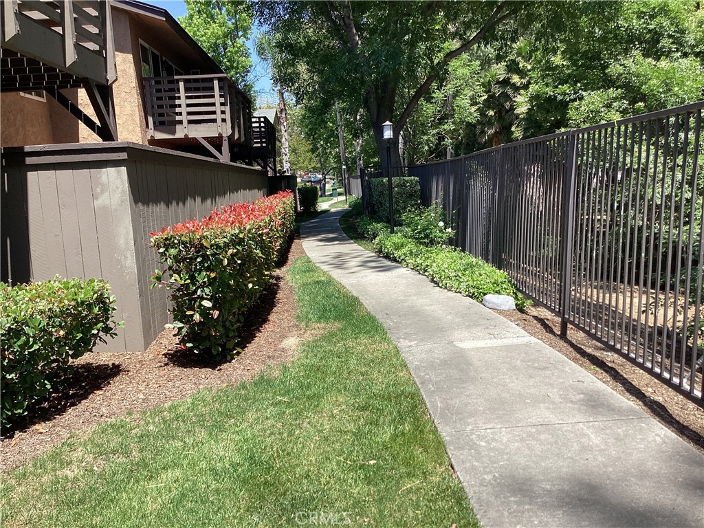 1480 West Lambert Road, Unit 288 La Habra, CA 90631 - Photo 2 of 13 a view of a backyard with pathway