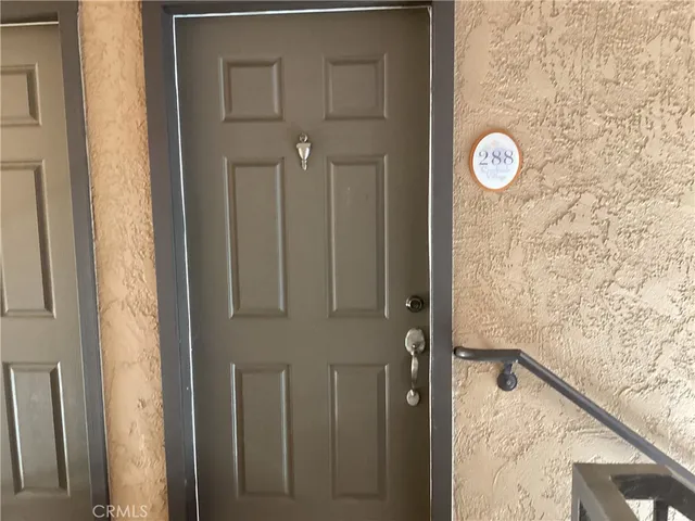 a kitchen with a sink appliances and cabinets